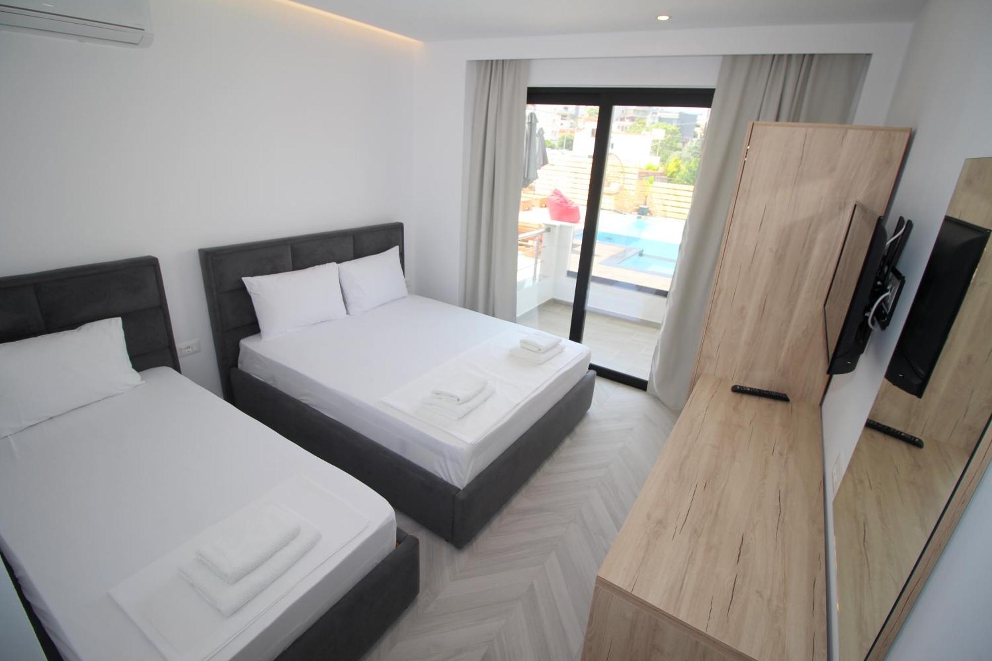 Noa Boutique Hotel Ksamil Quarto foto